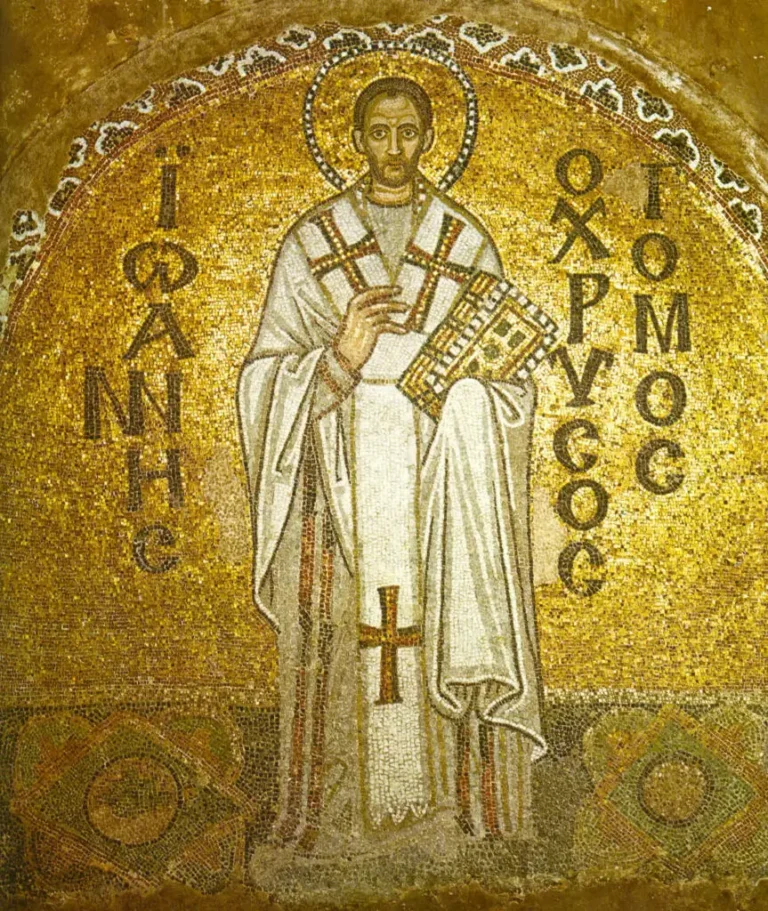 a mosaic of a man holding a book